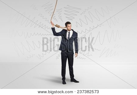 Hopeless young businessman trying to suicide with question signs concept