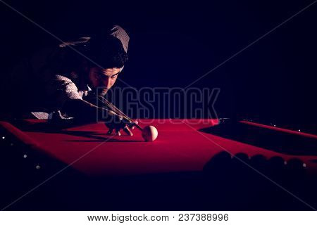 A Man With A Beard Plays A Big Billiard. Party In 12-foot Pool. Billiards In The Club Game For Men. 