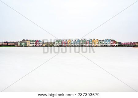In The Town Of Houten, These Beautifully Painted Houses Are On The Water