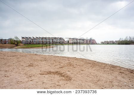 In The Town Of Houten, These Beautifully Painted Houses Are On The Water