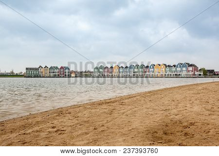 In The Town Of Houten, These Beautifully Painted Houses Are On The Water