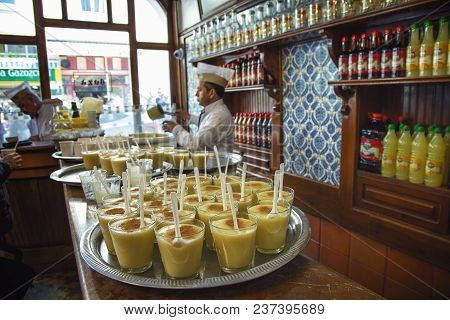 Istanbul, Turkey: Man Is Selling Boza Which Is A Traditional Fermented Beverage Known Since Ottoman 