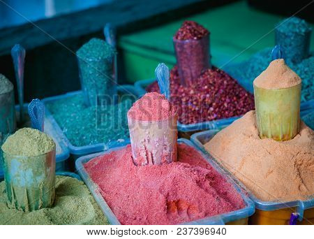 Various Spices From The Street Market. Colorful Georgian Suneli On Glasses In A Row. Oriental Spices