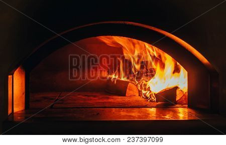 Fire Background. Beautiful Fire Close-up. Video. Burning Firewood In The Fireplace. Firewood Burn In