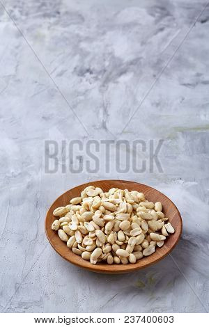 Pile Of Peelled Peanuts Isolated On White Textured Background, Background, Top View, Close-up, Selec