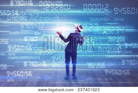 Businessman in vr glasses with variable fast changing numbers around