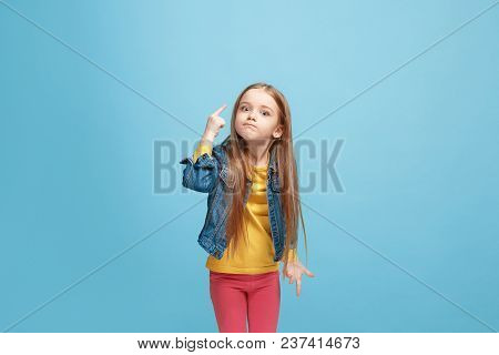 Argue, Arguing Concept. Profile Of Beautiful Female Half-length Portrait Isolated On Blue Studio Bac