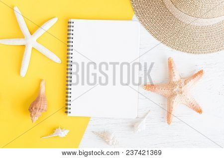 Flat Lay Notebook With Blank And Seashell For Summer Holiday On Yellow Paper On Whitewood,top View F