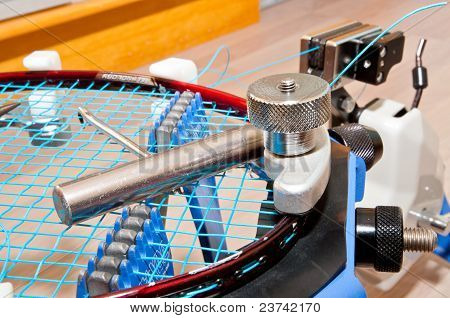 Zavěšování Badmintonové rakety