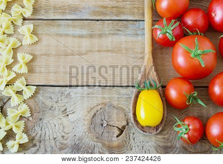 Beautiful Tasty Colorful Pattern Of Italian Pasta, Tomatoes. Top View. Abstract. Food Concept.