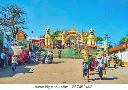 Kyaiktiyo, Myanmar - February 16, 2018: The Scenic Gate Of Kyite Htee Yoe Pagoda Decorated With Stat