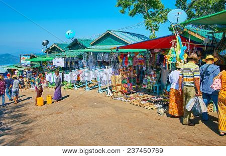 Kyaiktiyo, Myanmar - February 16, 2018: The Souvenir Market Stretches Along The Hilly Street, Leadin