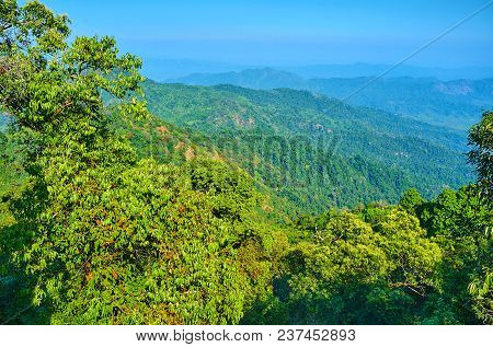 The Peak Of Kyaiktiyo Mount Opens The View On Amazing Mountain Landscape With Lush Green Forests In 