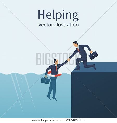 Business Helping Concept. Male With A Life Buoy In Water. Businessman Gives A Helping Hand To An Emp