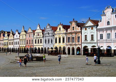 Telc, Czech Republic - July 16, 2014: Unidentified People Walking On The Main Square Of The Czech Ci