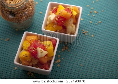 Fruit Salad Mix Of Melon, Banana, Watermelon, Orange And Pineapple In A Small Porcelain Bowl, Breakf