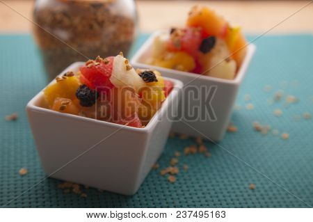 Fruit Salad Mix Of Melon, Banana, Watermelon, Orange And Pineapple In A Small Porcelain Bowl, Breakf