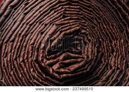 Material Brown Strongly Twisted In A Roll