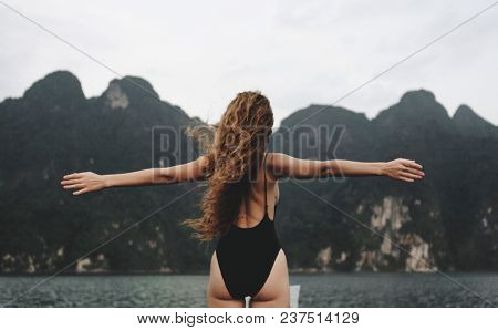 Beautiful woman posing at sunset