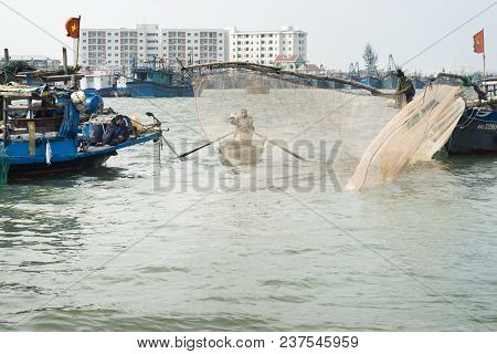 Fishermen Bringing Baskets With Shrimps To The Shoreside, Wooden Boats With Large Fishing Nets. Dece