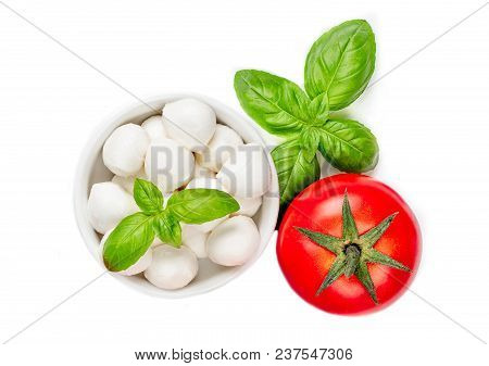Fresh  Salad  Ingredients With Mozzarella Cheese, Tomatoes, Basil And Spices Isolated On White Backg