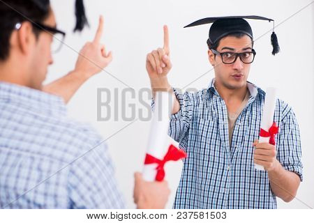 Young student planning graduation speech in front of mirror