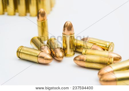9Mm Full Metal Jacket Bullet With Gun On White