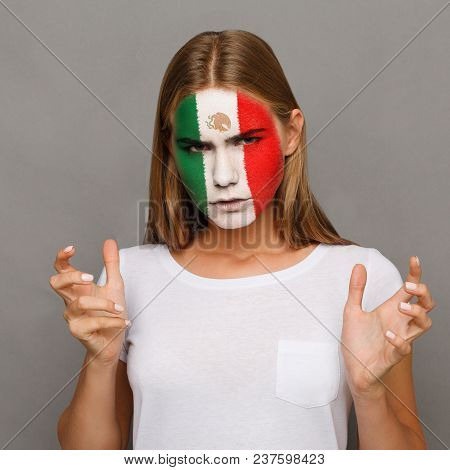 Face Of Young Sad Woman Painted With Flag Of Mexica. Football Or Soccer Team Fan, Sport Event, Facea