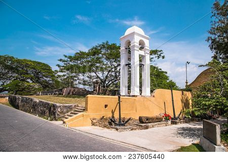 The white bell tower at dutch Galle fort in Sri lanka.  Galle is the largest city and port in the south of Sri Lanka the capital of the southern province and a popular tourist destination.