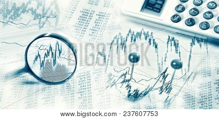 Stock Prices As Graphs And Tables With Magnifier And Calculator In Panoramic Format