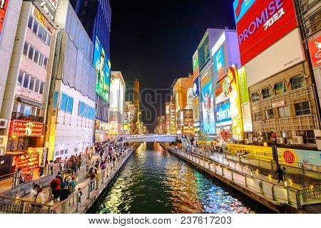 Osaka, Japan - April 29, 2017: Night Cityscape Of Dotonbori Canal And Famous Glico Running Man Sign 