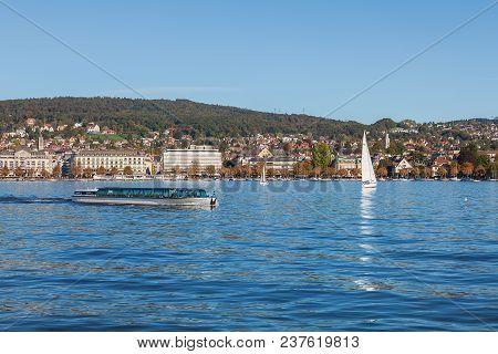Zurich, Switzerland - 13 October, 2013: Regula Boat With Passengers On Board On Lake Zurich, Buildin