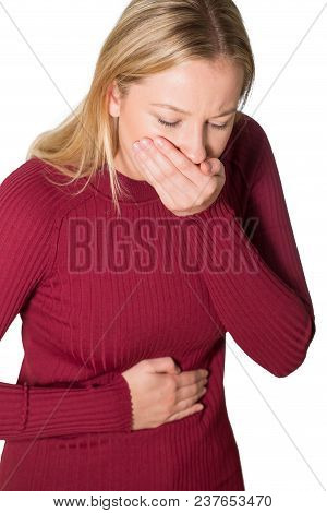 Studio Shot Of Young Woman Suffering From Nausea