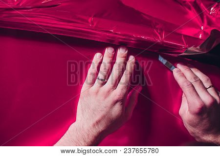 Car Wrapping Specialist Putting Vinyl Foil Or Film On Car Wrapping Protective Film Yacht, Boat, Ship