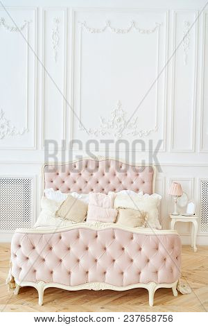 Big Comfortable Royal Bed With Pillows In Elegant Bedroom Interior, Copy Space. Honeymoon Suite, Fre