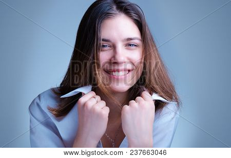 Cheerful, Flirtatious Office Manager, Secretary Smile In White Shirt. Portrait Of Pretty Caucasian Y