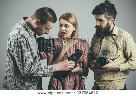 Men In Checkered Clothes, Retro Style. Vintage Photography Concept. Company Of Busy Photographers Wi