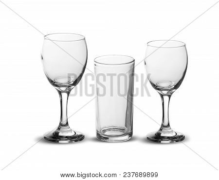 Empty Three Glasses For Water, Juice And Wine, Isolated On White Background