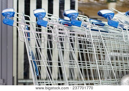 Shopping Trolleys Near The Mega Mall. Basket For Shop
