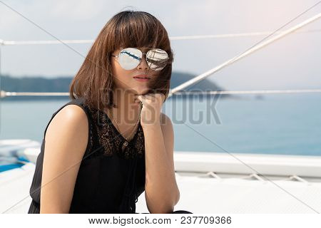 Asian Beautiful Woman Portrait On Luxury Yacth In The Sea And Blue Sky Background, Portraits Women C