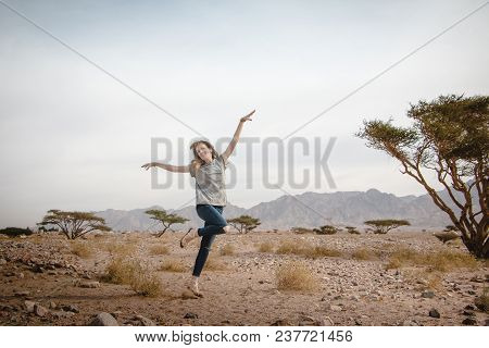 Girl Have Fun In Desert In A Summer Day
