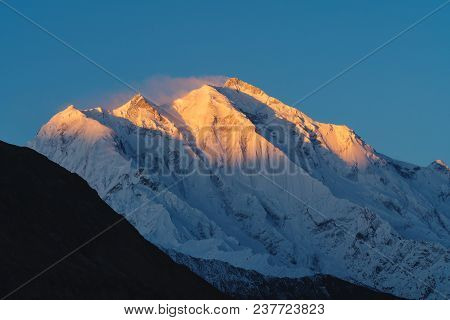 Mountain Peak With First Sunlight During Sunrise On Top In The Morning. Rakaposhi Mountain Peaks In 