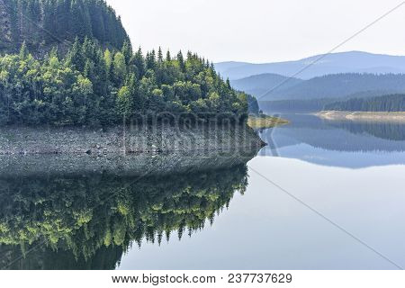 Daylight Misty View To Oasa Dam Lake With Mountains