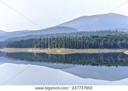 Daylight Misty View To Oasa Dam Lake With Mountains