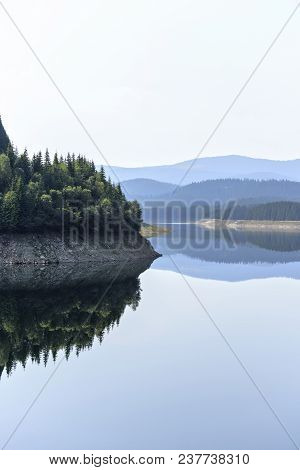 Daylight Misty View To Oasa Dam Lake With Mountains