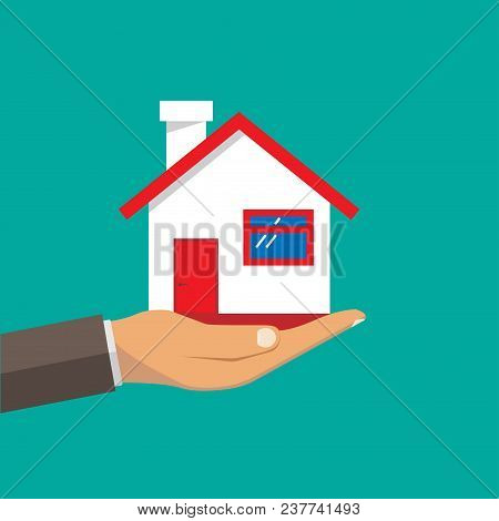 Hand Agent With Home In Palm . Offer Of Purchase House, Rental Of Real Estate. Giving, Offering, Dem