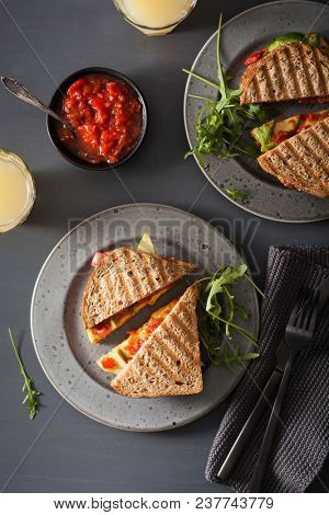 grilled cheese sandwich with avocado and tomato