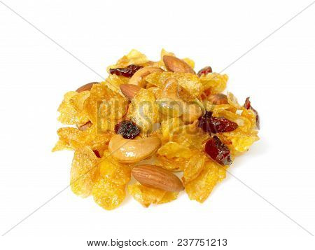 Crunchy Caramel Conflakes With Almonds, Cashew Nuts, Pumpkin Seeds And Dried Cranberries Isolated On
