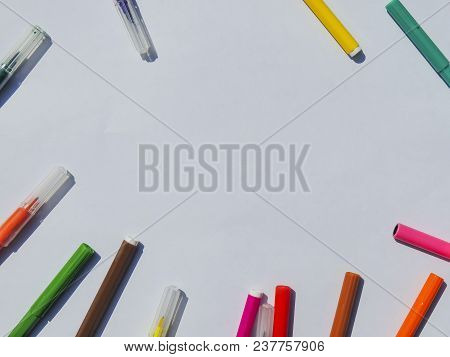 White Sheet Of Paper With Markers. View From Above