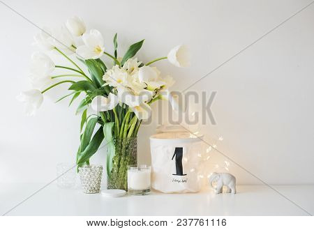 Large Bouquet Of White Spring Flowers In A Vase, Daffodils, Tulips And Feces In Home Interior Decor